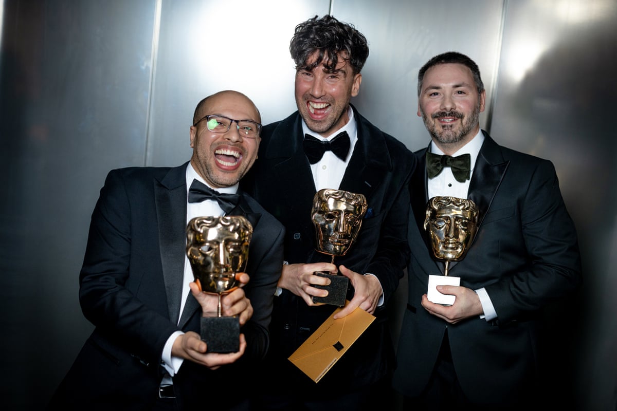 Dean Atta, Ben Jackson and Baz Sells with the Bafta for British short animation for Two Black Boys in Paradise.
