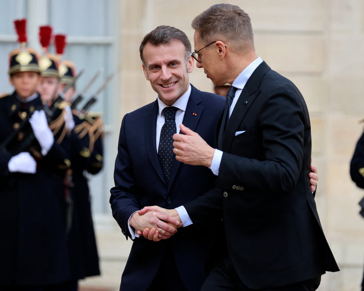 France's president Emmanuel Macron welcomes Finland's president Alexander Stubb before a meeting at the Élysée Palace in Paris.