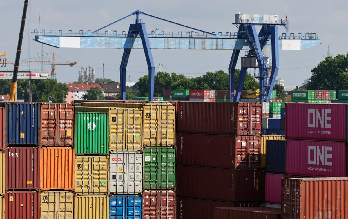Shipping containers stacked at the Rhine-Neckar commercial port in Mannheim, Germany.