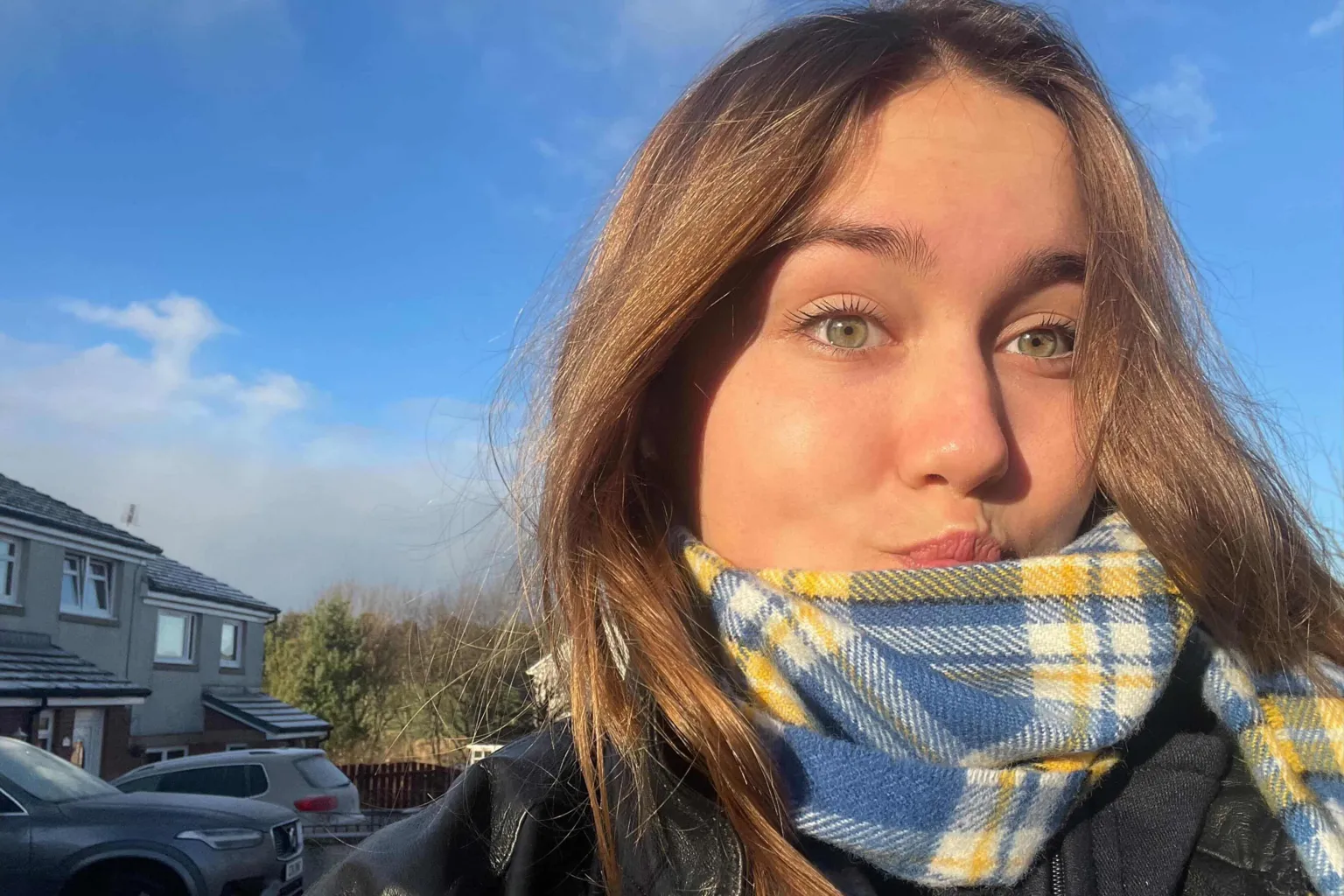 Alisa Nartova A selfie of Alisa Nartova wearing a blue and yellow Ukraine special tartan scarf.