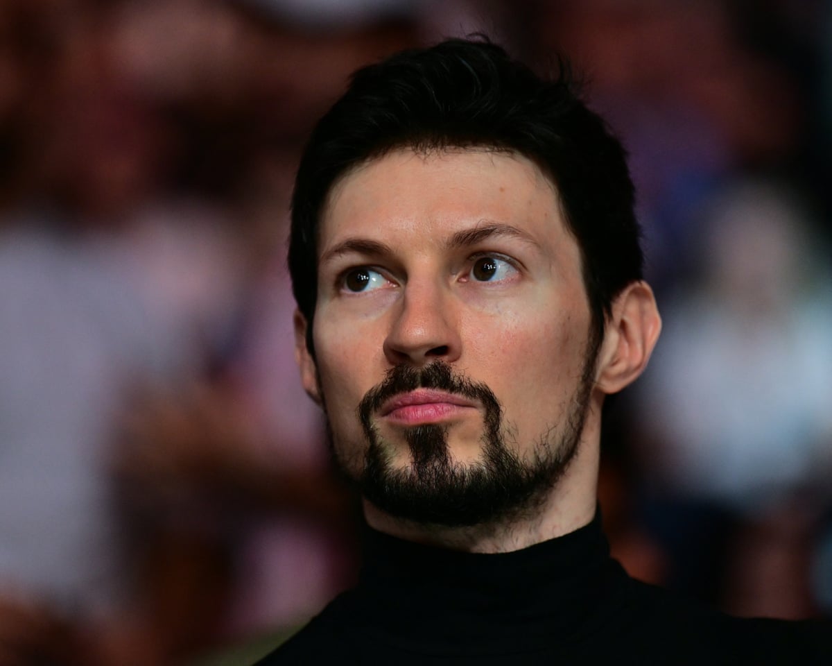 Head and shoulders of Pavel Durov who has dark hair and neatly trimmed beard and moustache