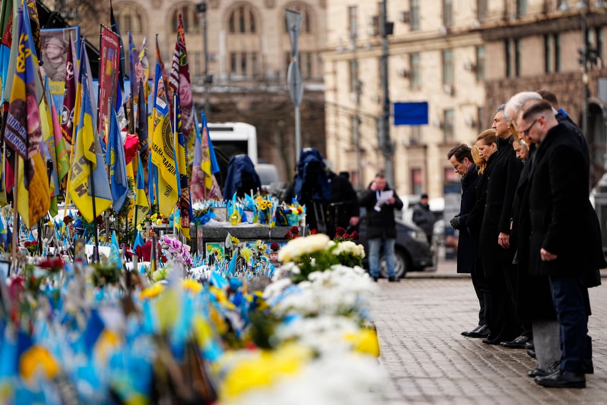 European leaders take part in a memorial ceremony for fallen soldiers at Maidan Square in Kyiv, Ukraine.