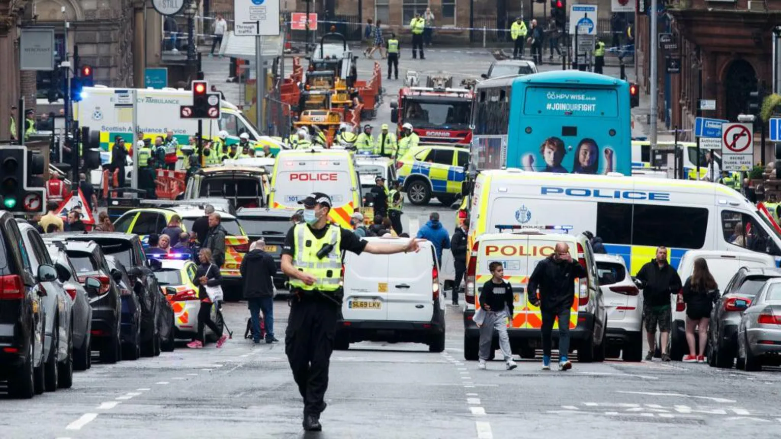  Looking down St Vincent Street in Glasgow city centre - there is a large number of emergency vehicles blocking the road with an area outside the Park Inn hotel cordoned off