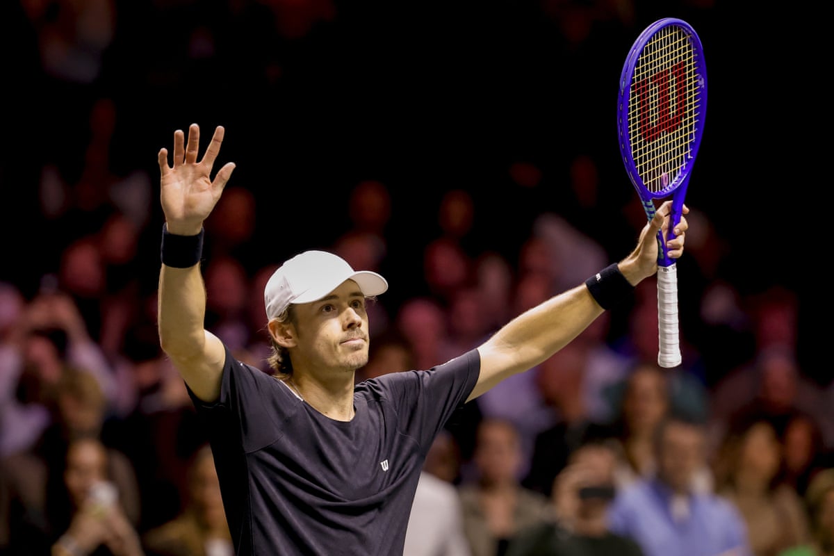 Alex de Minaur celebrates defeating Felix Auger-Aliassime during the singles final of the ABN AMRO tennis tournament