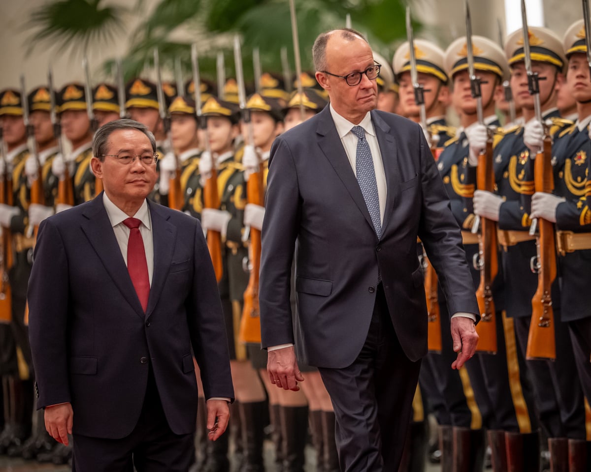 Friedrich Merz is welcomed with military honors at the Great Hall of the People by Li Qiang, Premier of China, in Beijing, China.