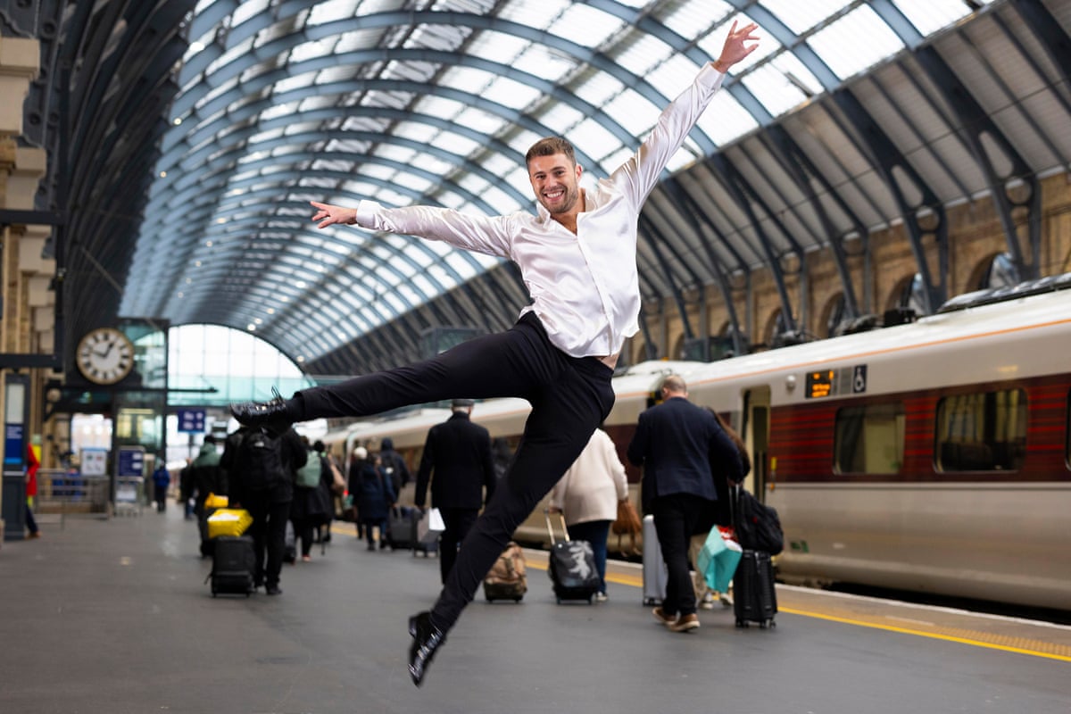 Dancer Curtis Pritchard unveils Trainline's pop-up experience, The Way to Train Station, on Quitter's Day in Januaryat King’s Cross station.