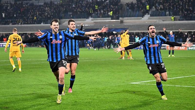 Atalanta players celebrate scoring against Dortmund