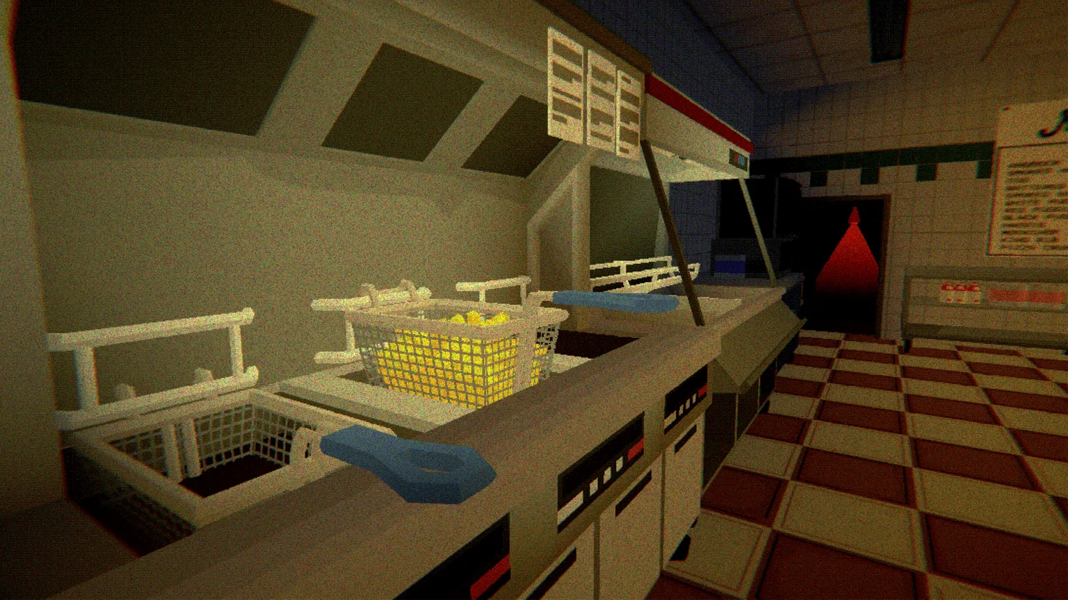 James Muirhead Screenshot from a horror computer game set inside Mac’s Fish Bar, showing a row of metal fryers with baskets of chips under bright heat lamps, blue-handled fryer baskets resting on the counter, red-and-white tiled flooring, and a dark back doorway illuminated by an ominous red light.