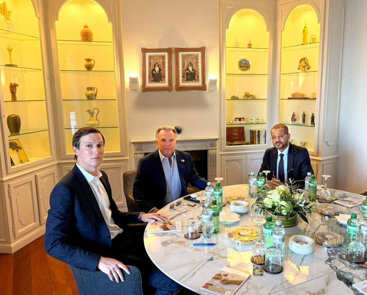 Badr Albusaidi, Steve Witkoff and Jared Kushner sat on a table with refreshments. 