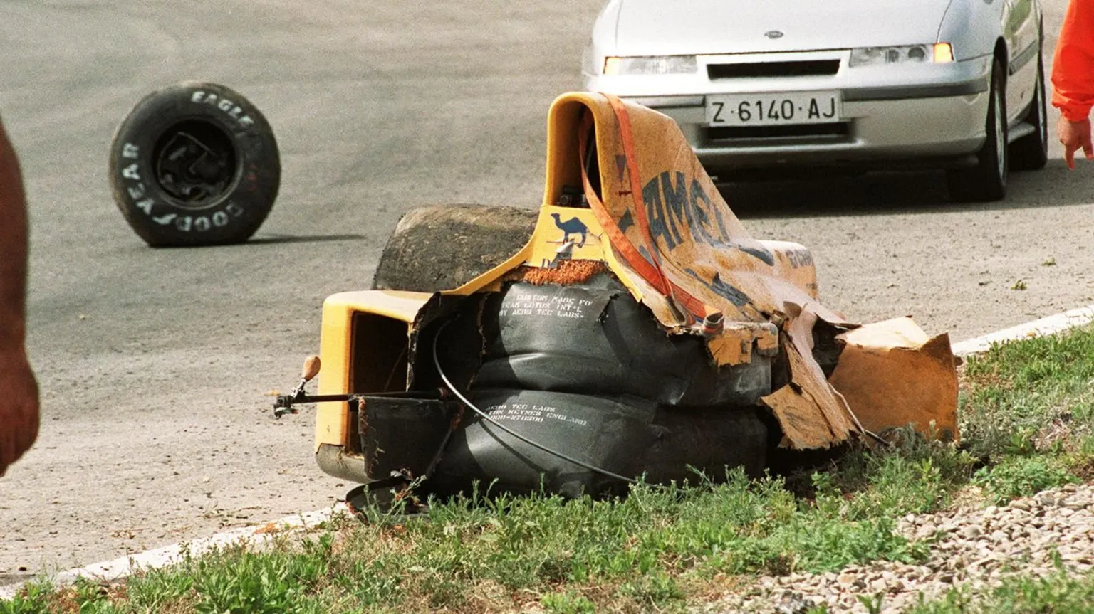  The aftermath of a crash involving a yellow Lotus car at Jerez in Spain in 1990. The yellow car is the remnants of the Lotus driven by Martin Donnelly.