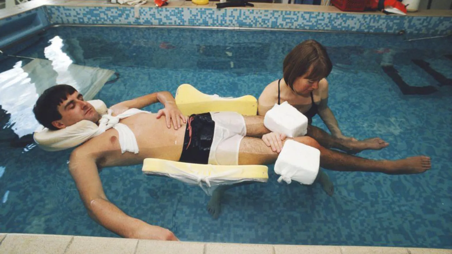  Formula One racing driver Martin Donnelly, who survived an horrific crash while driving his Camel-Lotus 102 Lamborghini racing car at the Spanish Grand Prix in Jerez in 1990. Donnelly's crash ended his F1 racing career, his injuries so severe that he was placed in a coma for seven weeks. Photographed as he underwent part of his rehabilitation at the Norfolk and Norwich Hospital near his home in Norfolk, UK, on Thursday, November 22, 1991. (Photo by Bryn Colton/)