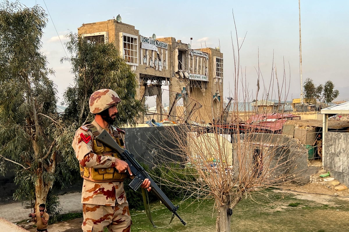 A soldier stands guard at the Friendship Gate at the border crossing in Chaman, Pakistan