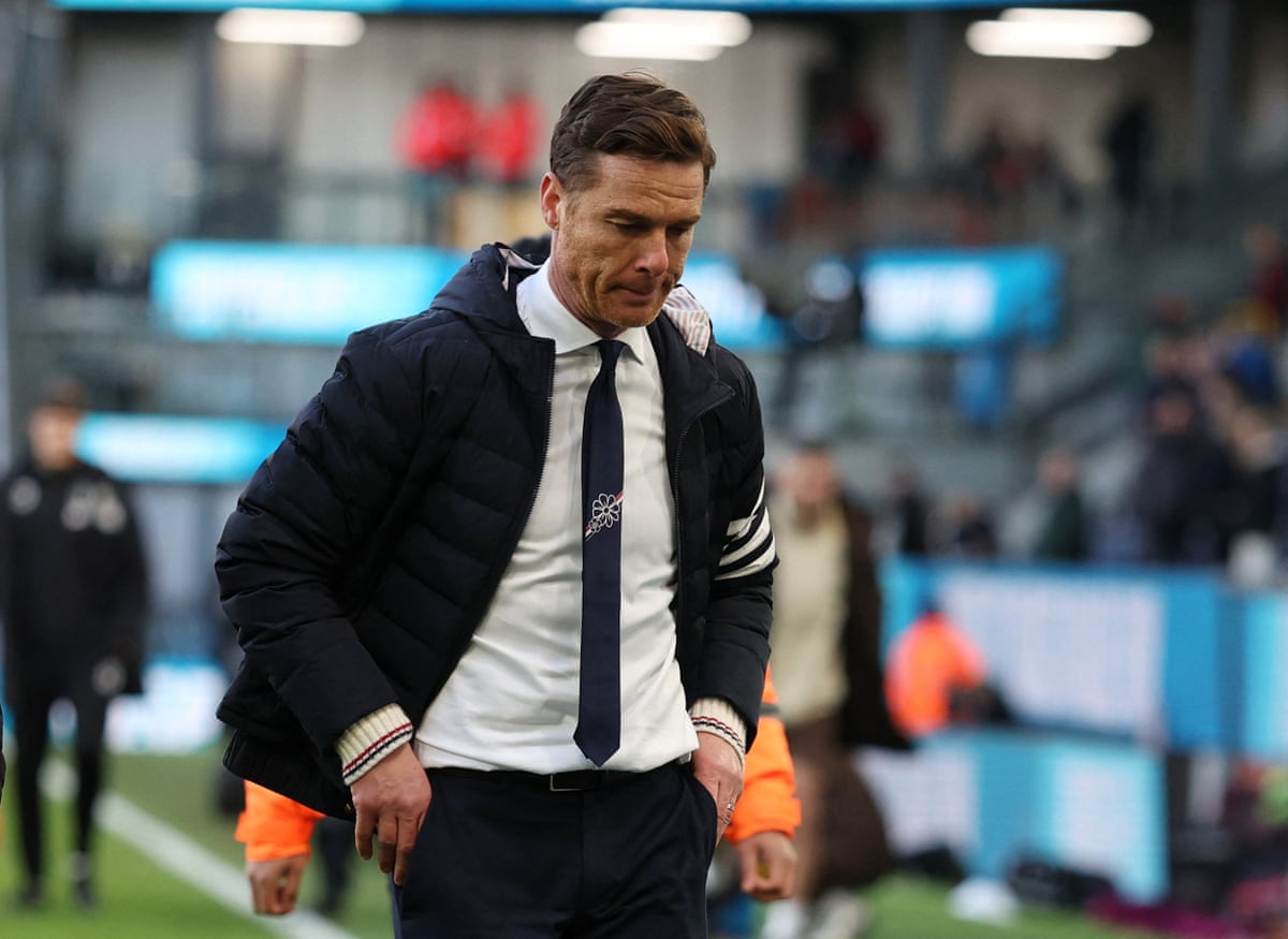 Burnley manager Scott Parker looks dejected after the match
