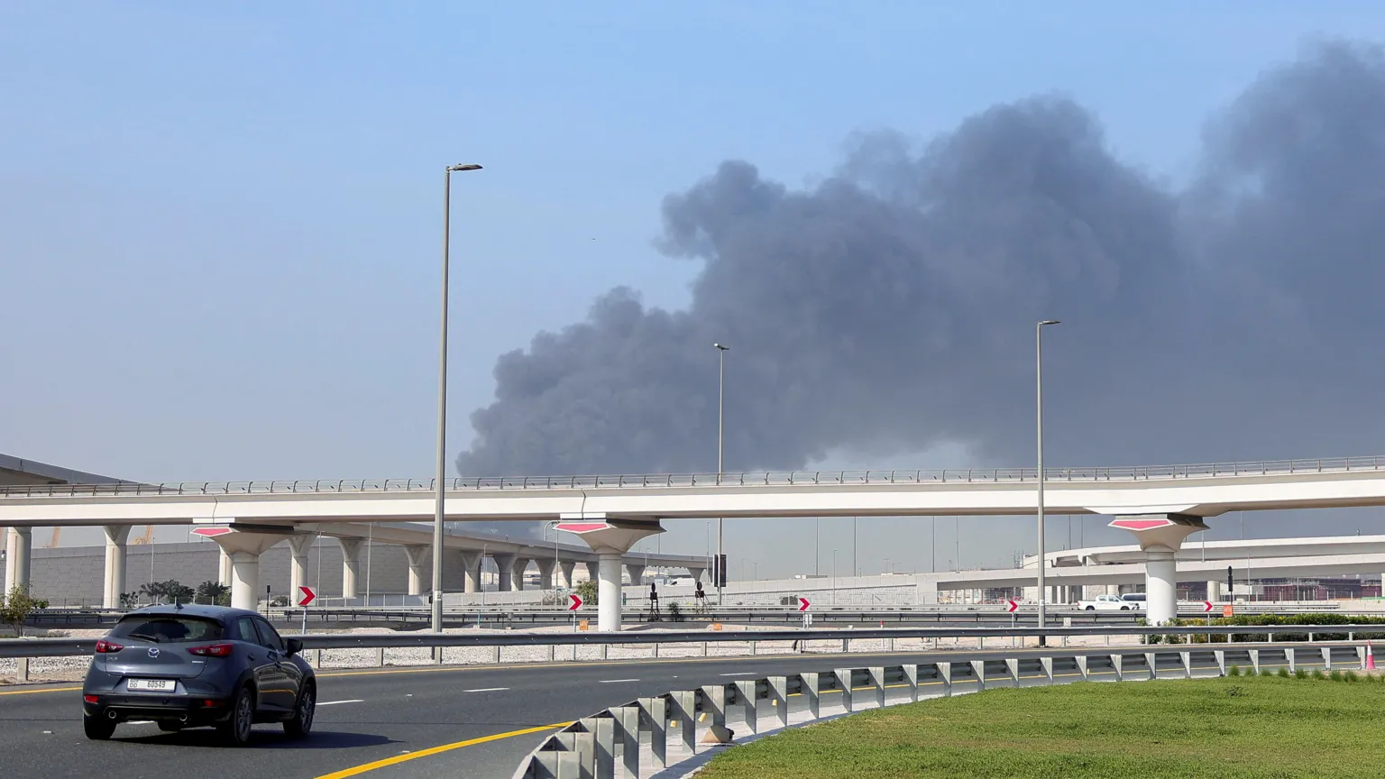 /Raghed Waked Smoke rising from an attack on the Jebel Ali port in Dubai.