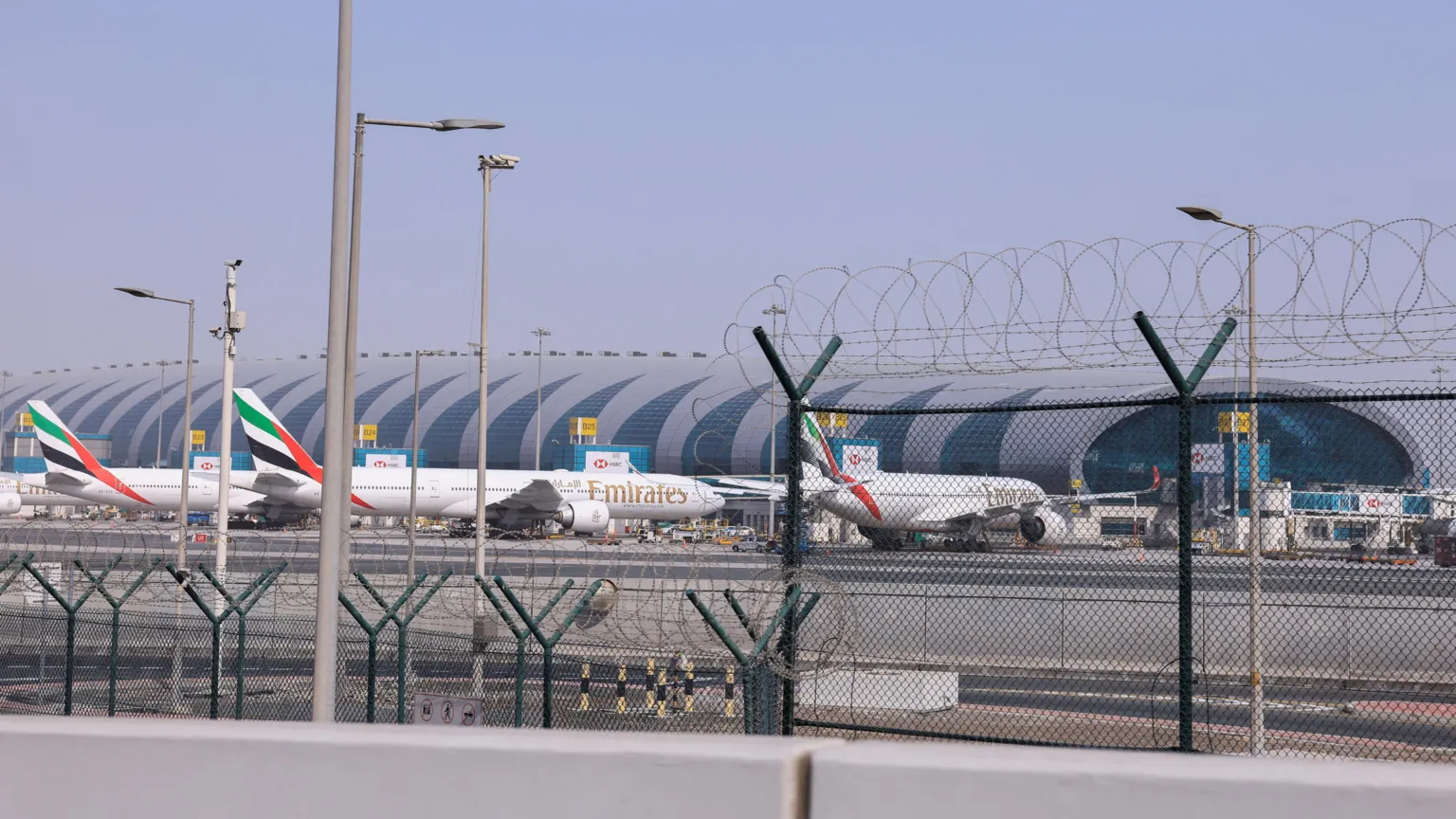  Planes parked at Terminal 3 of the Dubai International Airport, following the United States and Israel strikes on Iran, in Dubai