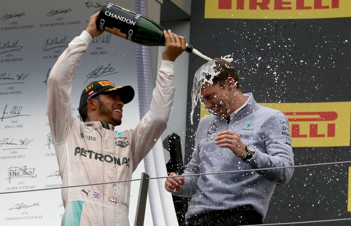 James Vowles is doused in champagne by Lewis Hamilton during his tenure at Mercedes in 2016
