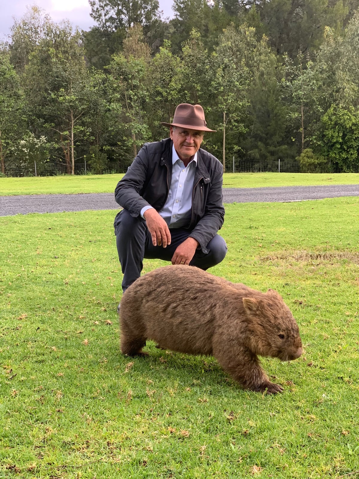 Ken Henry with a wombat