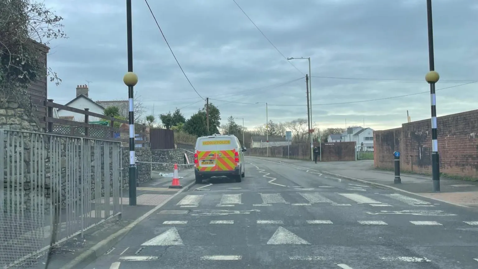 The back of a police van parked on a residential street in Pencoed.