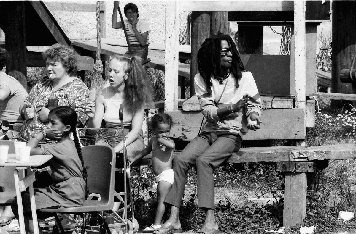 People sitting on chairs and benches