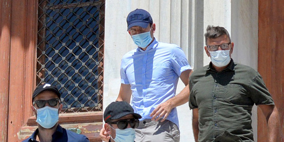 Harry Maguire (centre) outside court in Greece in 2020.