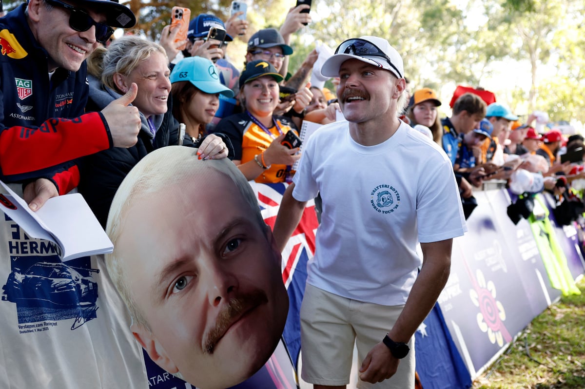 Cadillac's Valtteri Bottas greets fans in Melbourne.