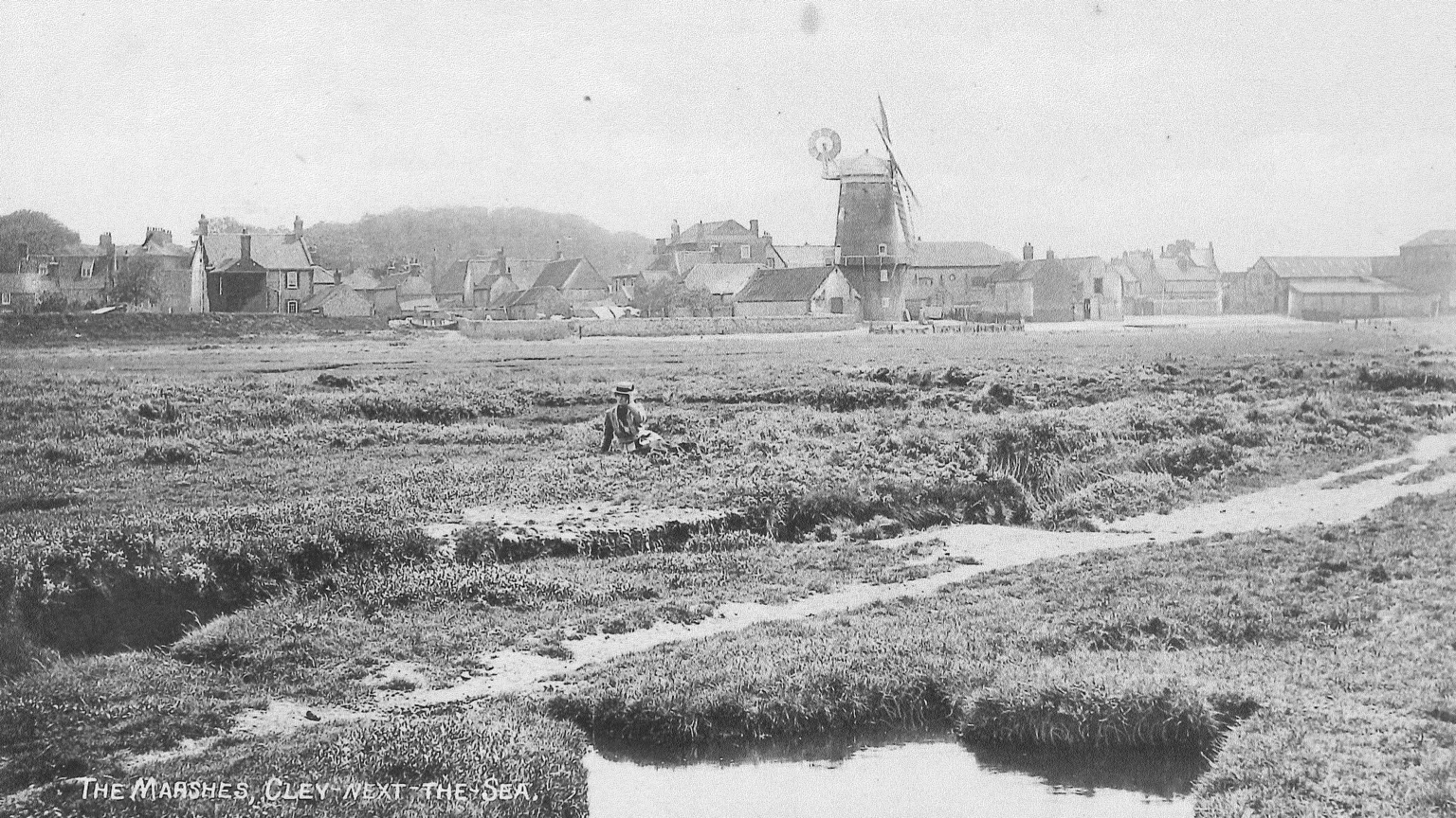Norfolk Wildlife Trust A black and white photograph of the marshes at Cley next the Sea.