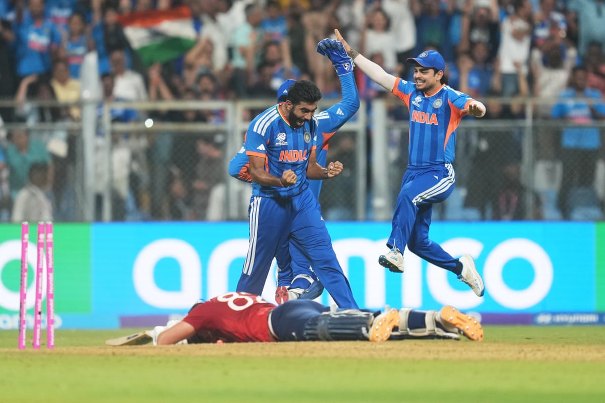 India players celebrate a wicket. 