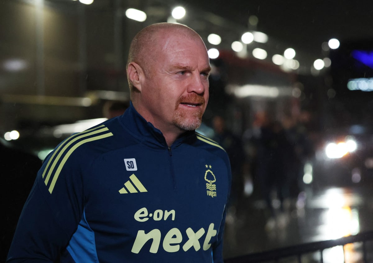 Sean Dyche wearing blue and yellow Nottingham Forest kit.