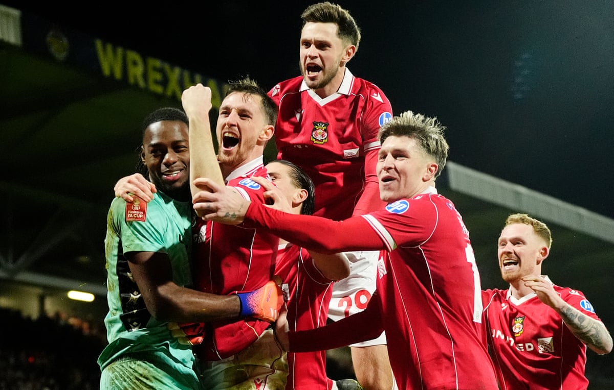Wrexham's players including Arthur Okonkwo and Dominic Hyam celebrate beating Nottingham Forest in the FA Cup