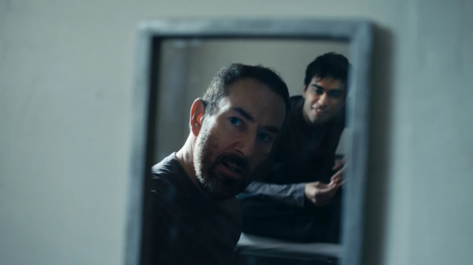 Jailbroken Films A man stares in a mirror