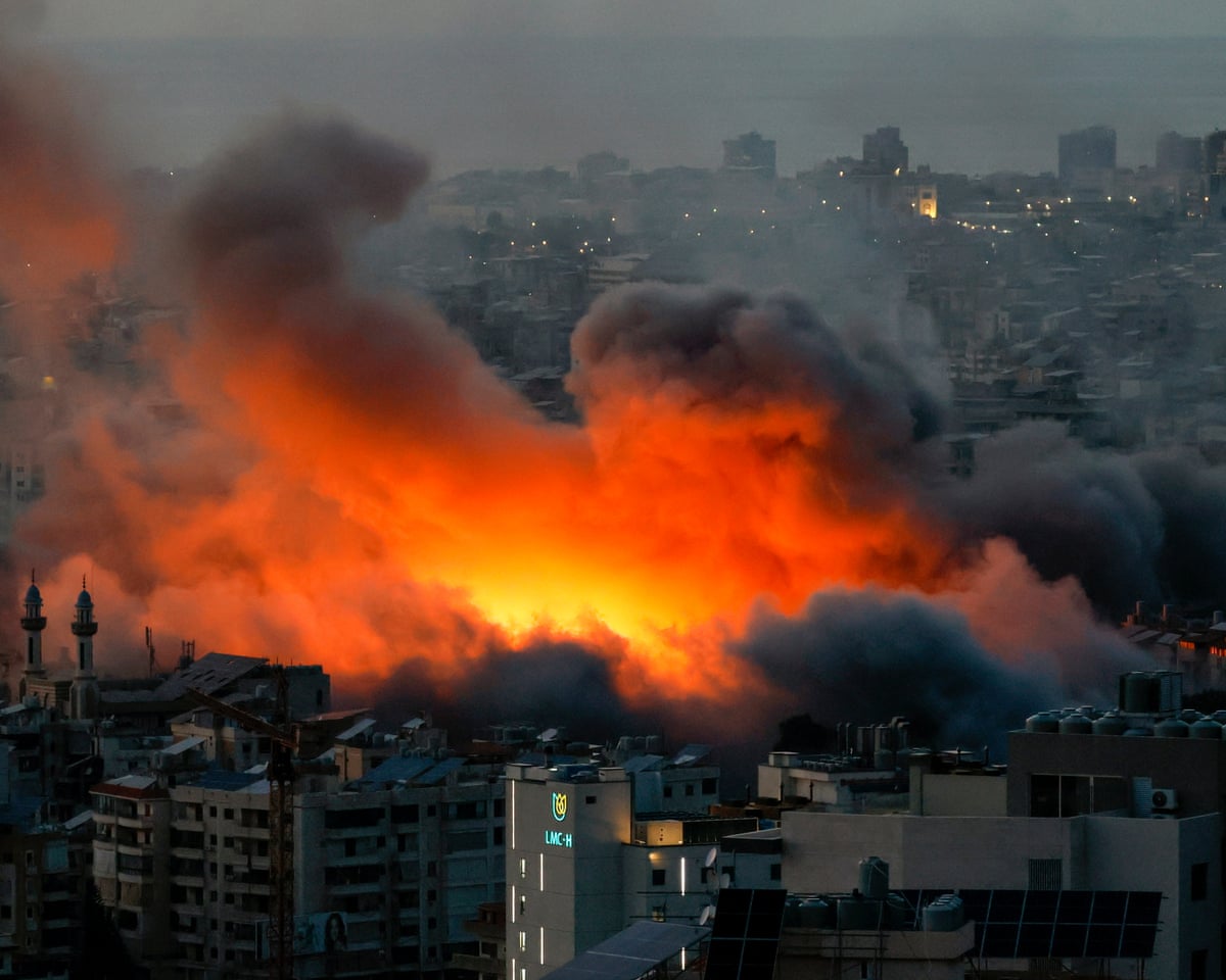 Smoke and flames rise following an Israeli airstrike on Dahieh, a predominantly Shia Muslim suburb in the south of Beirut, Lebano