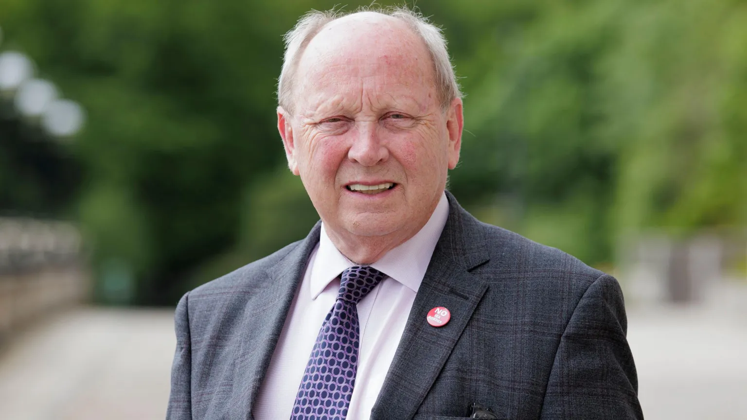  Jim Allister, with grey hair and suit