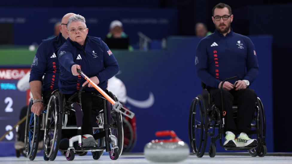 Great Britain's Karen Aspey delivers a stone