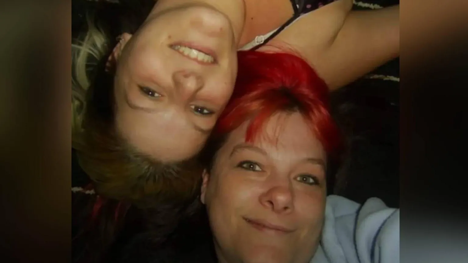 Chloe Callaghan Bethan Callaghan (left) poses for a selfie led down next to her mum, Gaynor, who has red hair and green eyes. Bethan has brown eyes and blonde hair. They both look at the camera. One is facing the right way around and the other is upside-down.