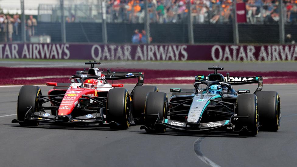 Mercedes' George Russell and Ferrari's Charles Leclerc side by side as they battled for the lead of the Australian Grand Prix