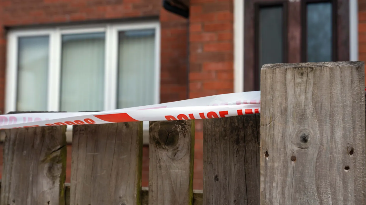 Pacemaker Red and white police tape on a fence in front of a house in the Corban Avenue area of Enniskillen.