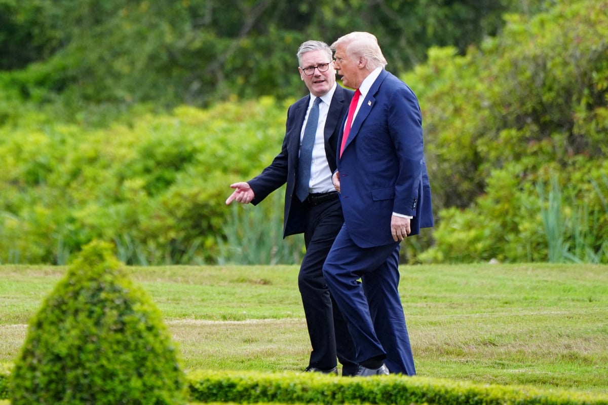 Donald Trump walks with Keir Starmer at Trump International Golf Links, in Aberdeen, Scotland, in July 2025.