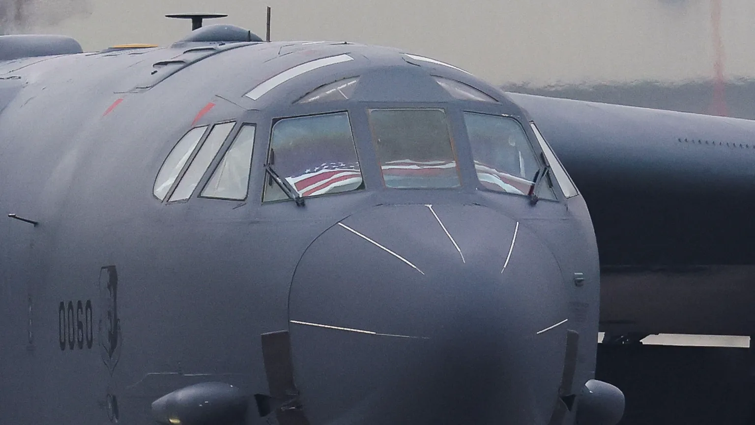  A U.S. national flag lies in a cockpit of the U.S. Air Force Boeing B-52 Stratofortress as it taxis after landing at RAF Fairford airbase, used by United States Air Force (USAF) personnel, amid the U.S.-Israeli conflict with Iran, in Fairford,