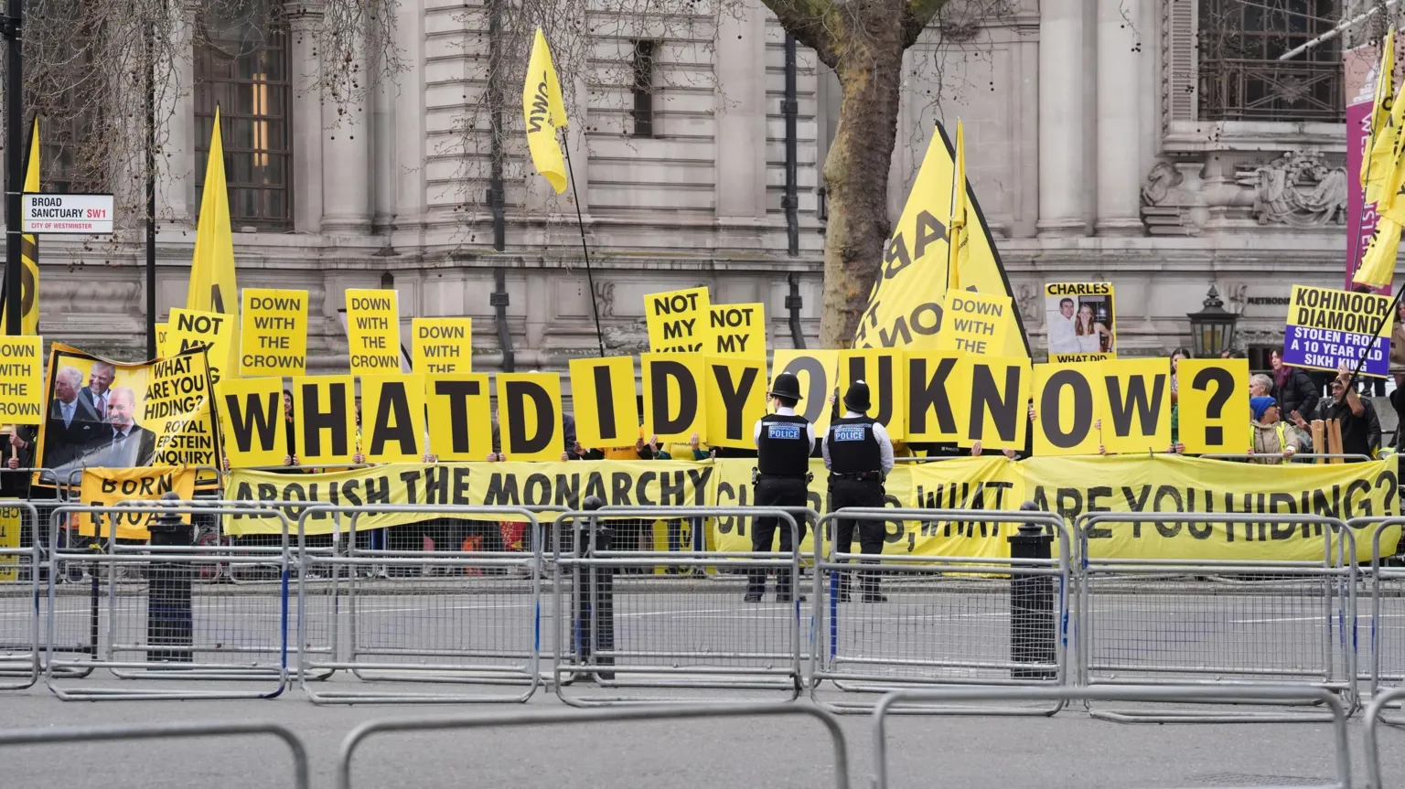  Republic campaigners with placards against the monarchy outside Westminster Abbey and the Commonwealth service