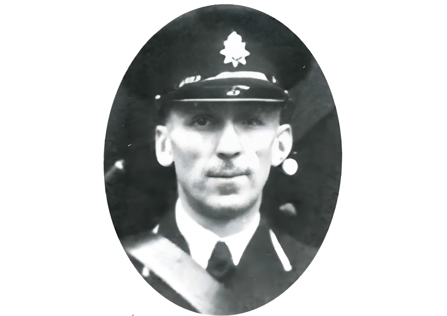 Family picture A black and white picture of a man with a helmet on and a moustache