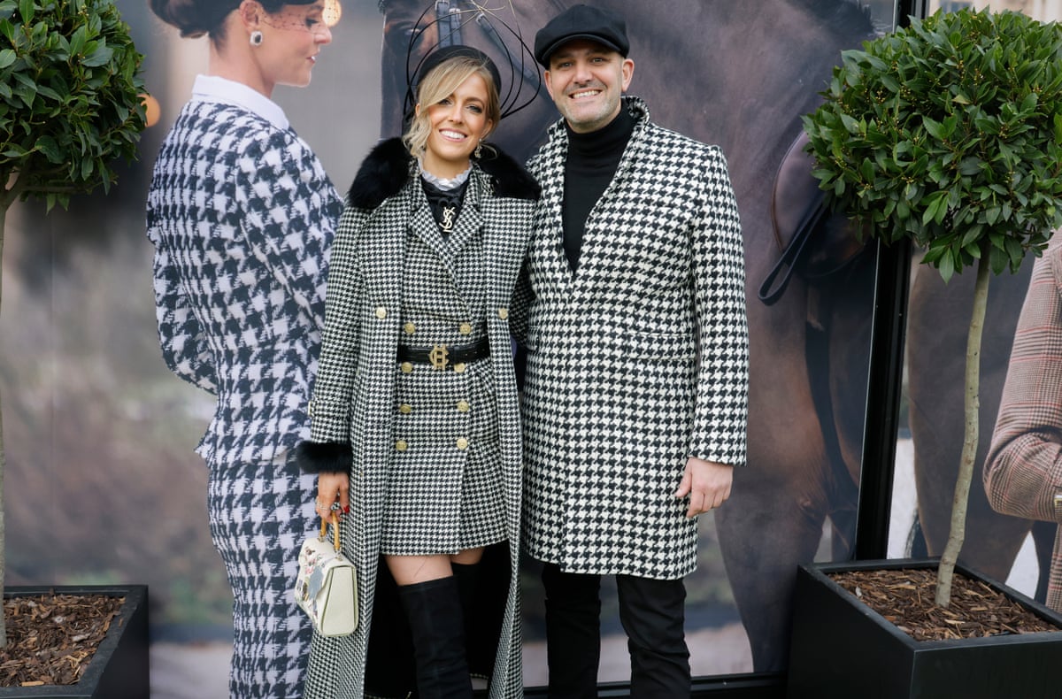 Sophie Hall and Jordan Wylie pose in houndstooth outfits