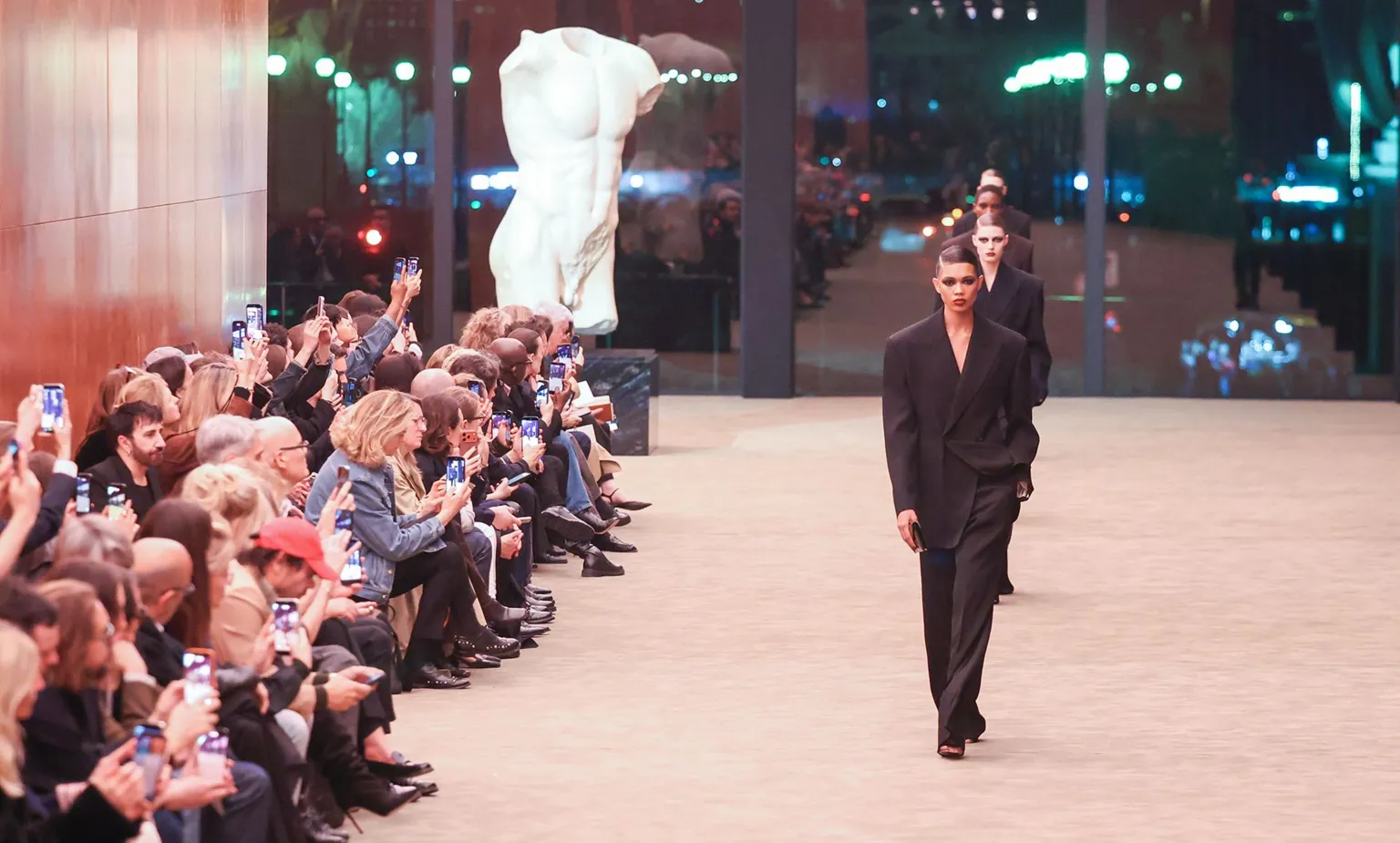 Stephane Cardinale/Corbis via Models walk the runway during the Saint Laurent Womenswear Fall/Winter 2026-2027 show as part of Paris Fashion Week on March 03, 2026 in Paris, France.