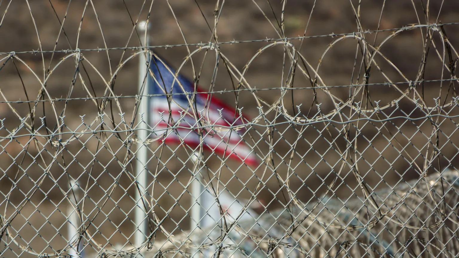  Barbed wire and American flag