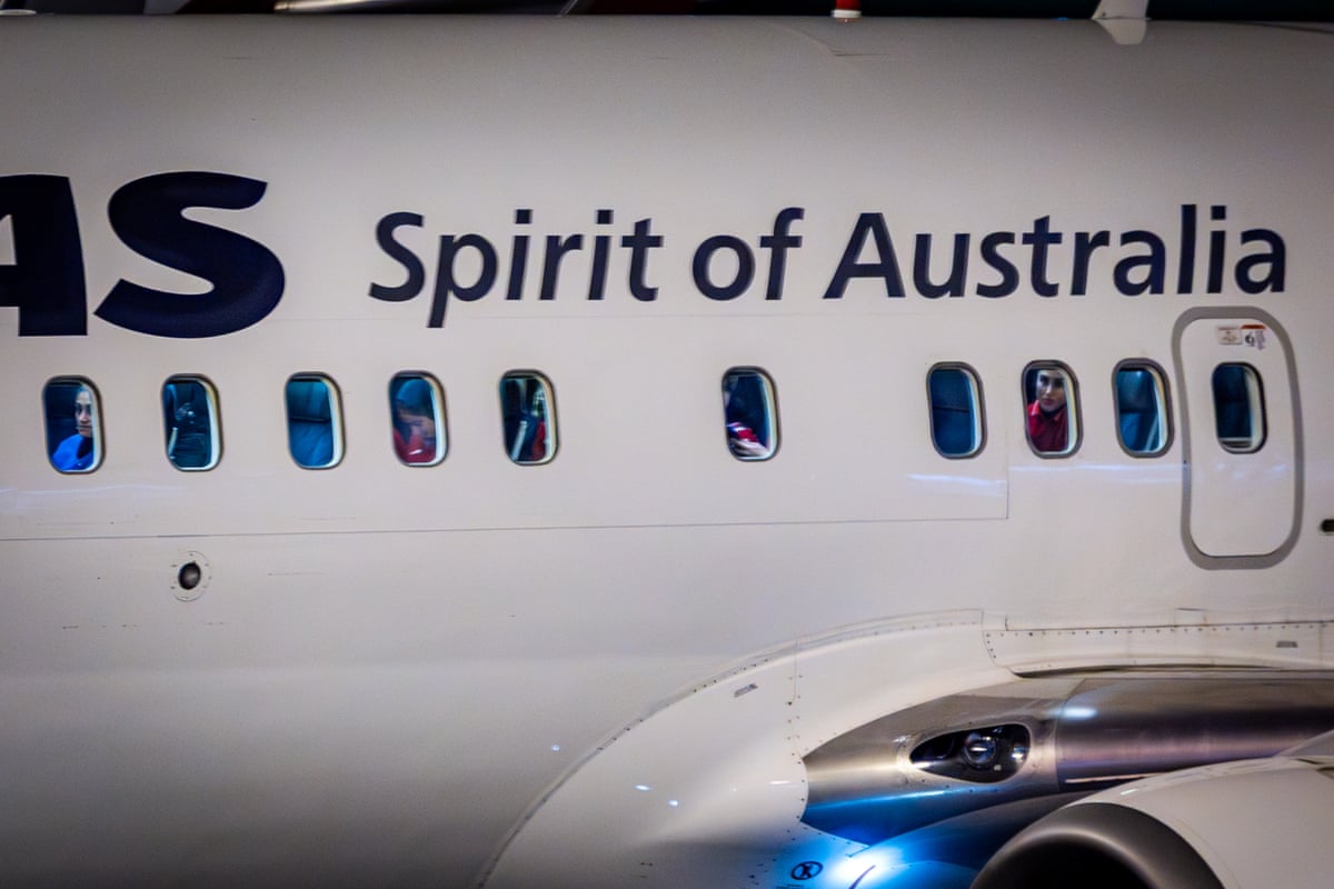 Iranian women’s football team players on board the Qantas flight that took them from the Gold Coast to Sydney.