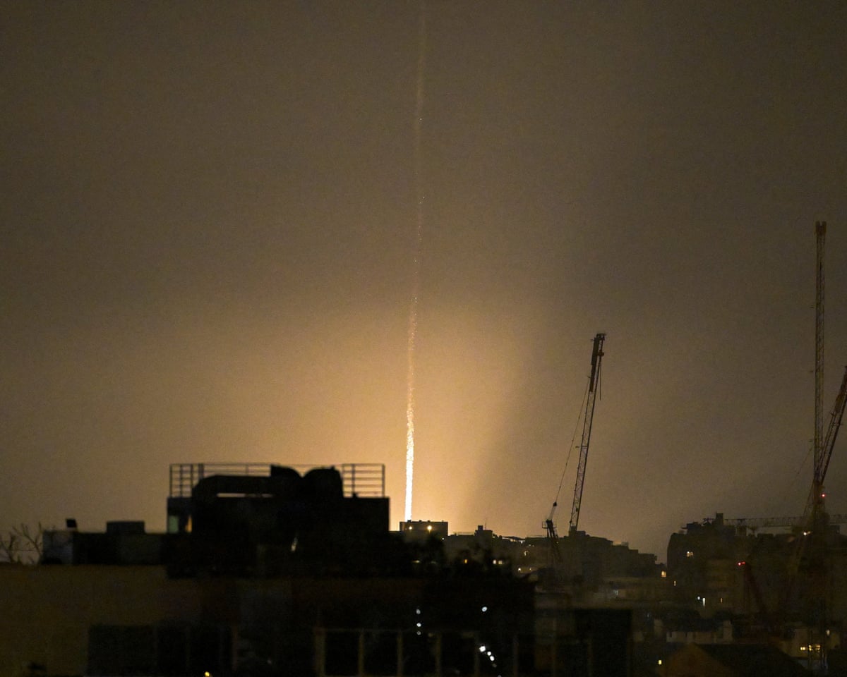 An Iranian missile lands in Israel, as seen from Tel Aviv, Israel