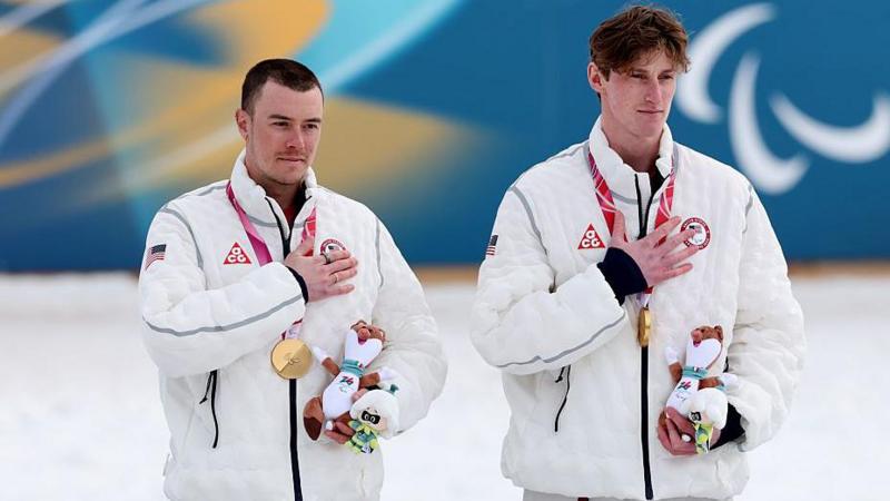 Jake Adicoff and guide Reid Goble on the medal podium at the Winter Paralympics