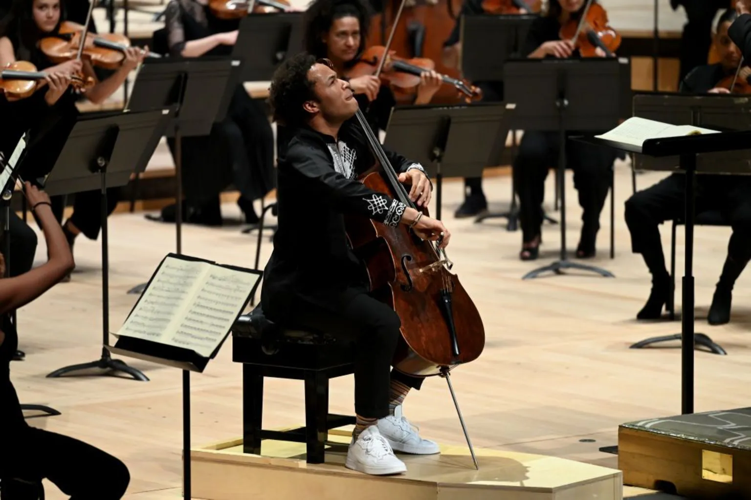 Sheku Kanneh-Mason screws his face up with concentration as he plays the cello