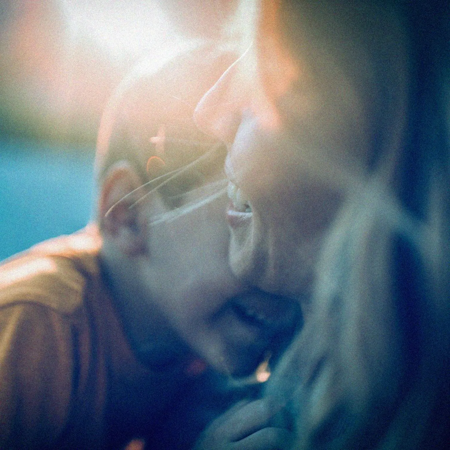  Mother hugging her young son