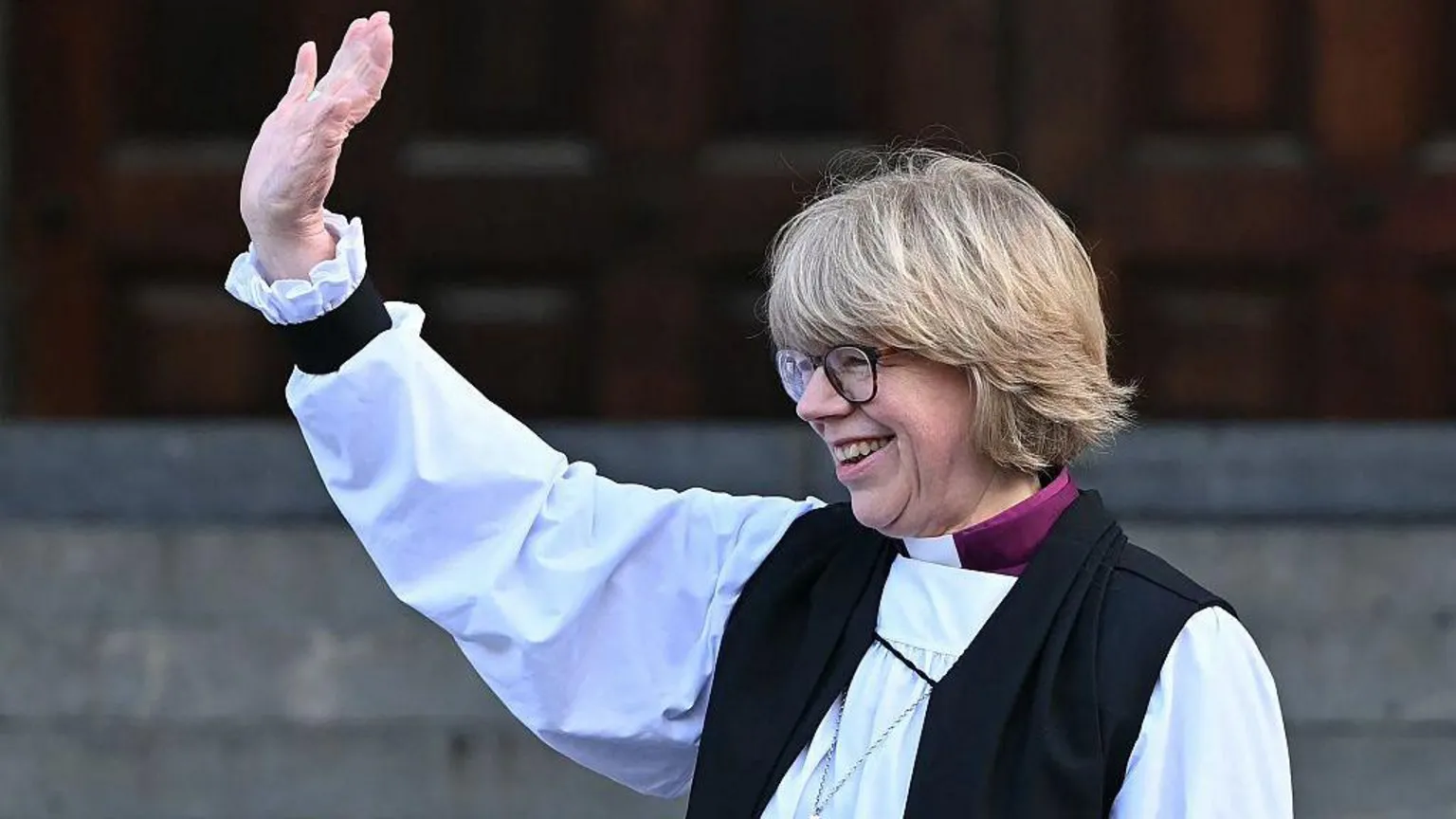  The new Archbishop of Canterbury Sarah Mullally waves from the steps of St Paul's Cathedral after taking part in a 'Confirmation of Election' ceremony in London