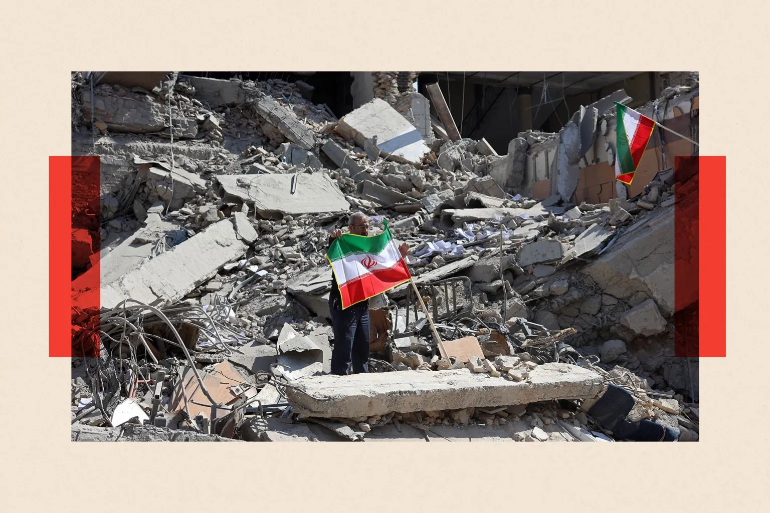 AFP via A man holds an Iranian flag amid the debris of a destroyed building following airstrikes in central Tehran 